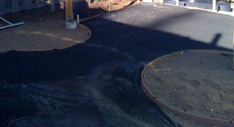 Landscape fabric in the process of being installed