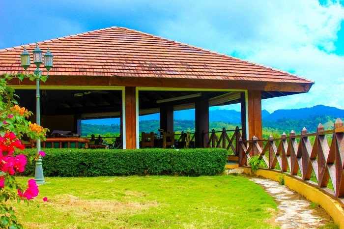 Large wood gazebo with shingle roof