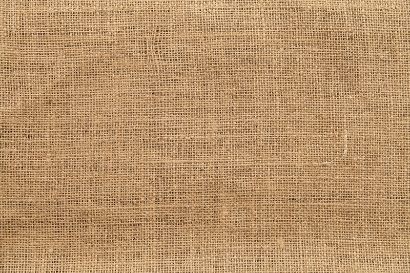 Close up of woven, burlap landscape fabric