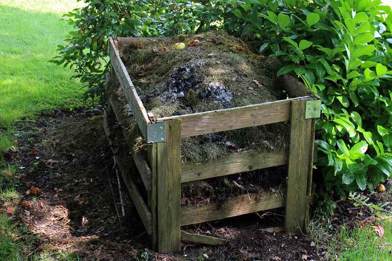 compost bin with grass clippings